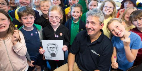 World Kids' Colouring Day winner celebrates with class and caricaturist